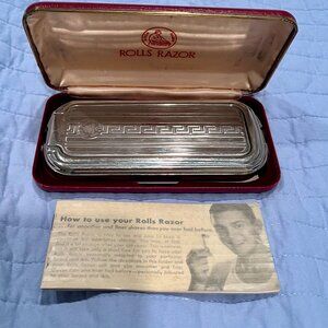 Antique/vintage Rolls Razor with red leatherette case